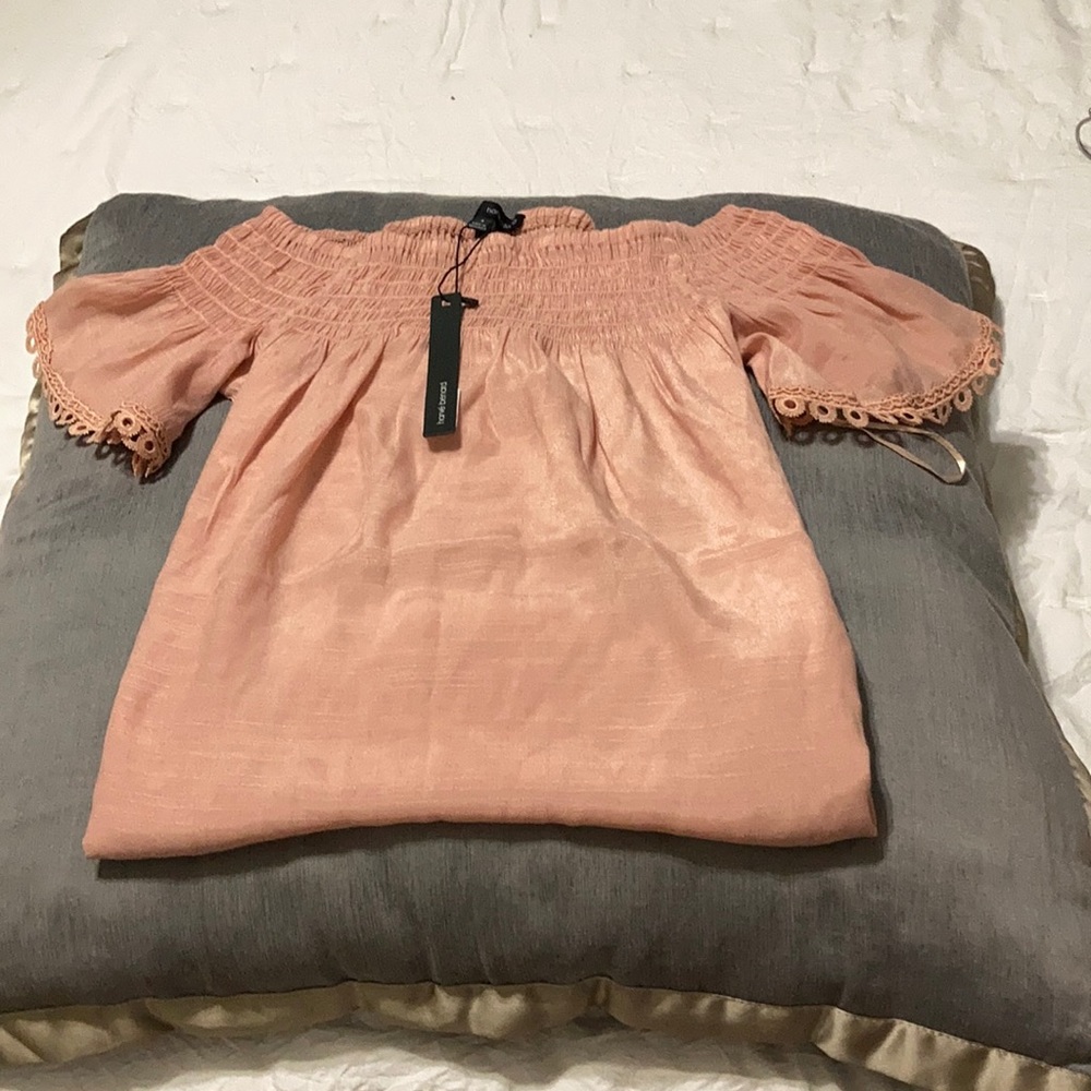 Flowy pink top with a little ruffles